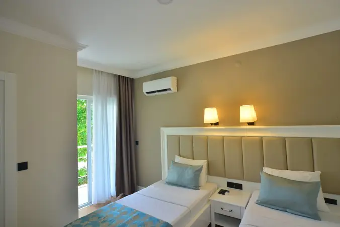 Standart Room - 22 m², deniz ve doğa manzaralı, 2 yetişkin + 1 çocuk için tasarlandı.